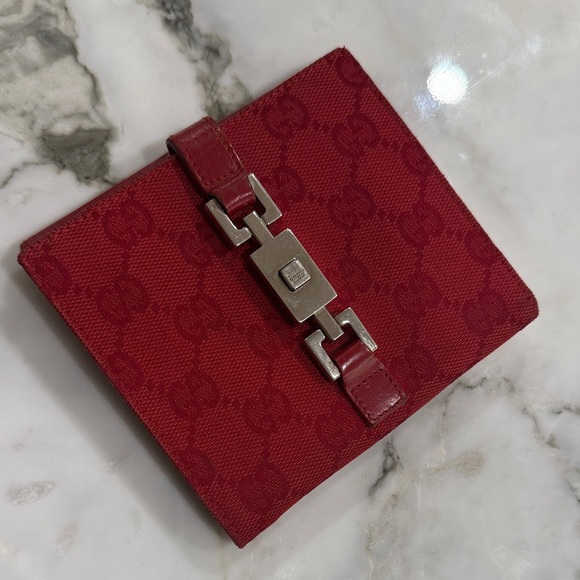 Gucci Handbags - Gucci Jackie bi-fold wallet in red
